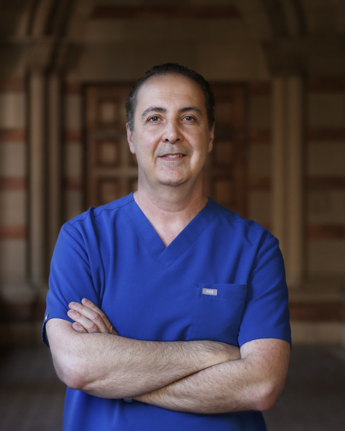 Dr. Raffy Karamanoukian MD FACS American Board Certified plastic surgeon performing torn earlobe repair earlobe reduction gauged earlobe correction and pixie ear facelift correction at Kare Beirut Lebanon